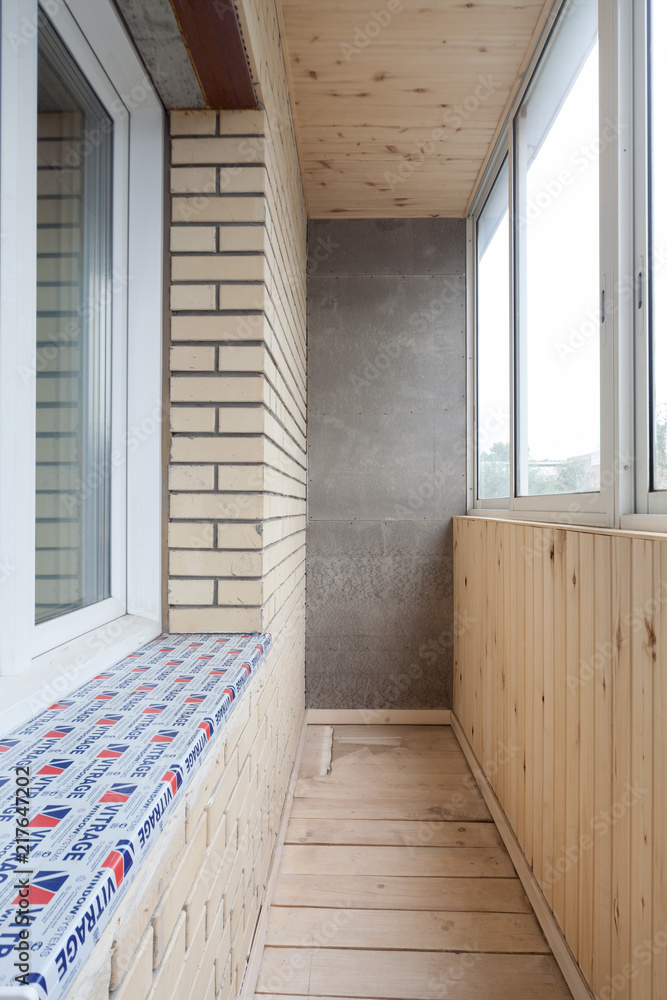Small balcony interior in modern apartment building Small balcony interior in modern apartment building