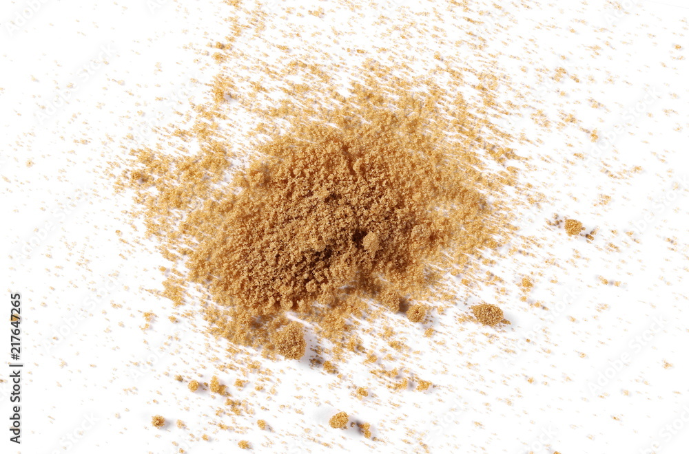 Unrefined brown cane sugar pile isolated on white background, top view Unrefined brown cane sugar pile isolated on white background, top view