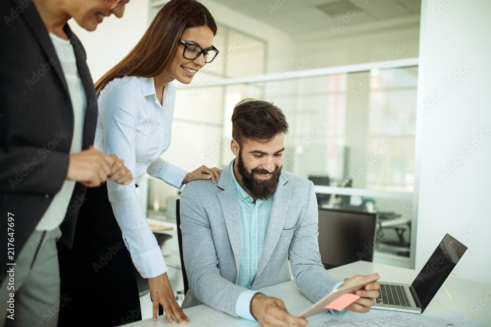 Fototapeta premium Picture of young architects discussing in office
