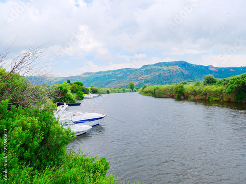 View of the river and fishing boats in the city of Bosa. province of Oristano  Sardinia  Italy.