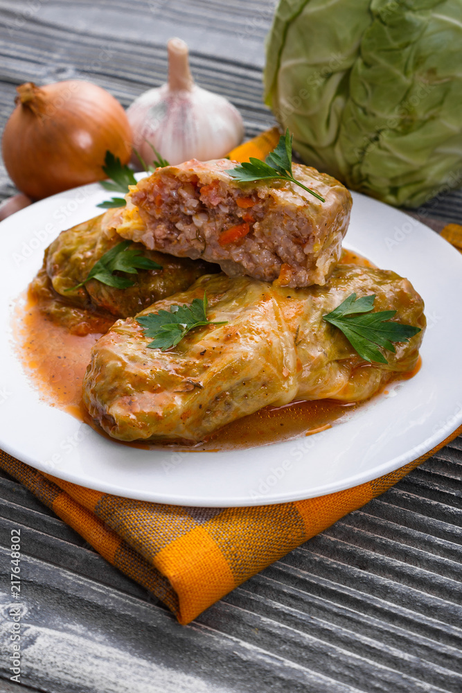 cabbage rolls on a wooden gray rustic background cabbage rolls on a wooden gray rustic background