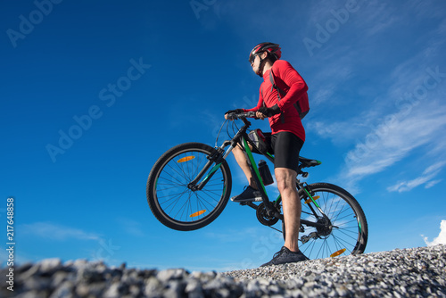 Young man riding mountain bike