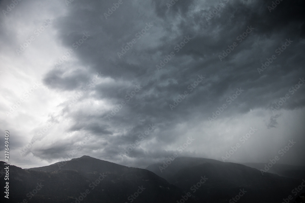 dark thunder clouds during rain storm in switzerland dark thunder clouds during rain storm in switzerland