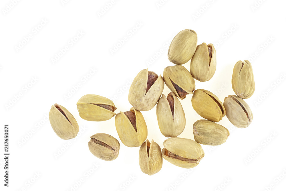 Pistachios isolated on white background, top view. Pistachios isolated on white background, top view.