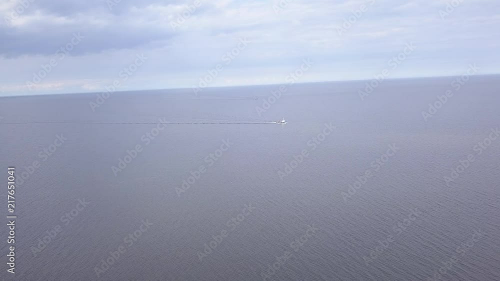 ship going in to Harbor Roja Latvia Aerial view of countryside drone top view 4K UHD video ship going in to Harbor Roja Latvia Aerial view of countryside drone top view 4K UHD video