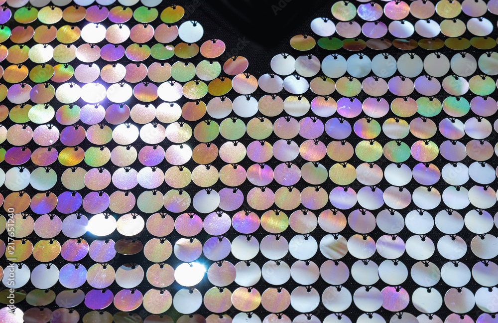 Texture of color pearlescent sequins, macro photo Texture of color pearlescent sequins, macro photo