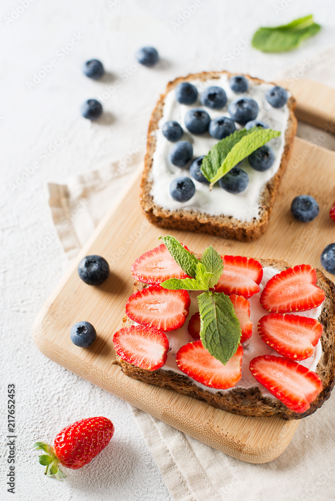 Strawberry and blueberry toast on breakfast. Healthy food Strawberry and blueberry toast on breakfast. Healthy food