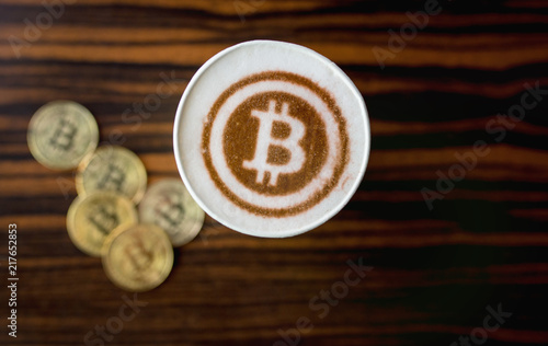 Printed on coffee printer bitcoin symbol. New technology