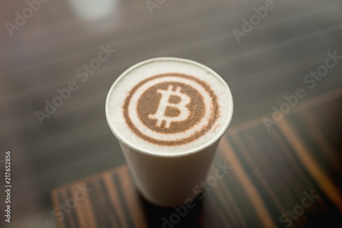 Bitcoin latte art. Printed bitcoin symbol.