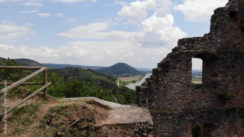 Stone walls of the ancient Donaustauf Castle, panoramic scene. Aerial view of Danube river and Walhalla memorial on the hill, Donaustauf, Bavaria, Germany Stone walls of the ancient Donaustauf Castle, panoramic scene. Aerial view of Danube river and Walhalla memorial on the hill, Donaustauf, Bavaria, Germany