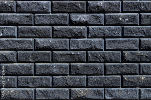 Grey wall as background, texture of a grey brick wall