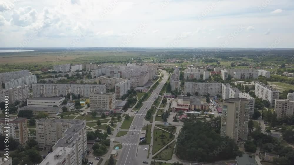 Residential multi-storey houses and buildings in the city of Netishin near Khmelnitsky nuclear power plant in Ukraine. Aerial view. Summer day with a cloudy sky Residential multi-storey houses and buildings in the city of Netishin near Khmelnitsky nuclear power plant in Ukraine. Aerial view. Summer day with a cloudy sky