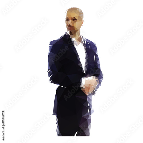Polygonal businessman standing in dark suit, geometric vector silhouette. Business people