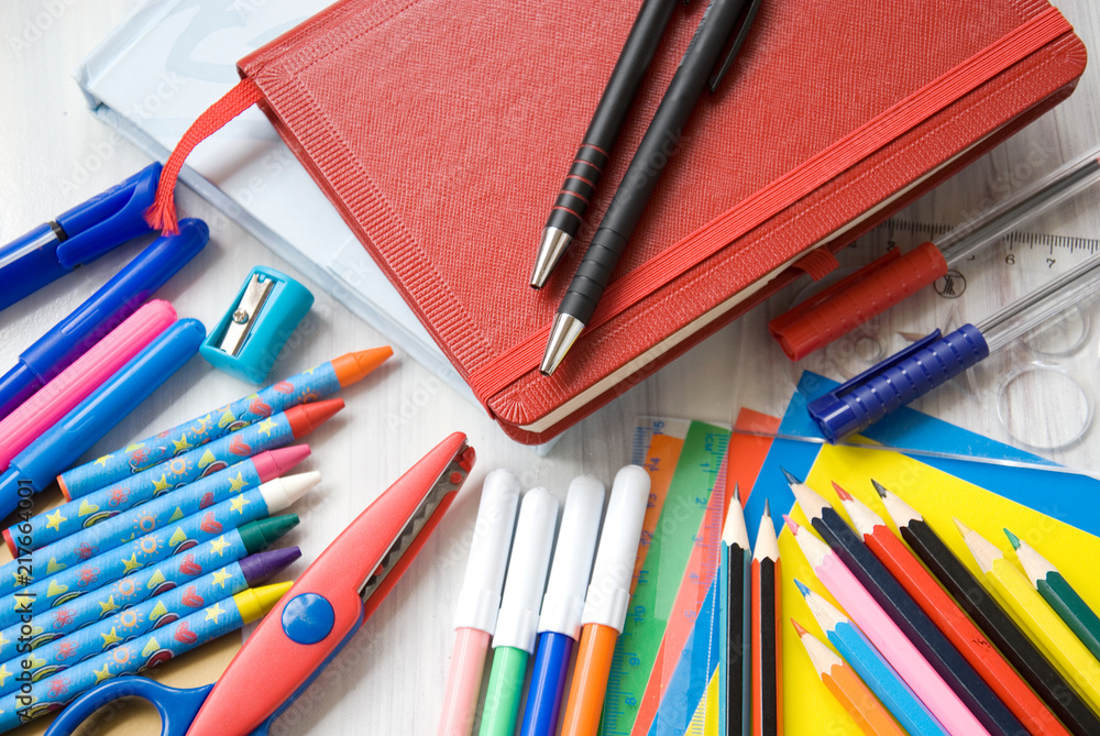 Fototapeta premium school supplies on a white table