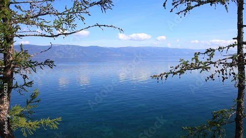Baikal Lake on sunny August day. View from the Olkhon Island to the Maloye More Strait photo