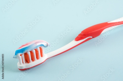 Colorful toothpaste on a toothbrush