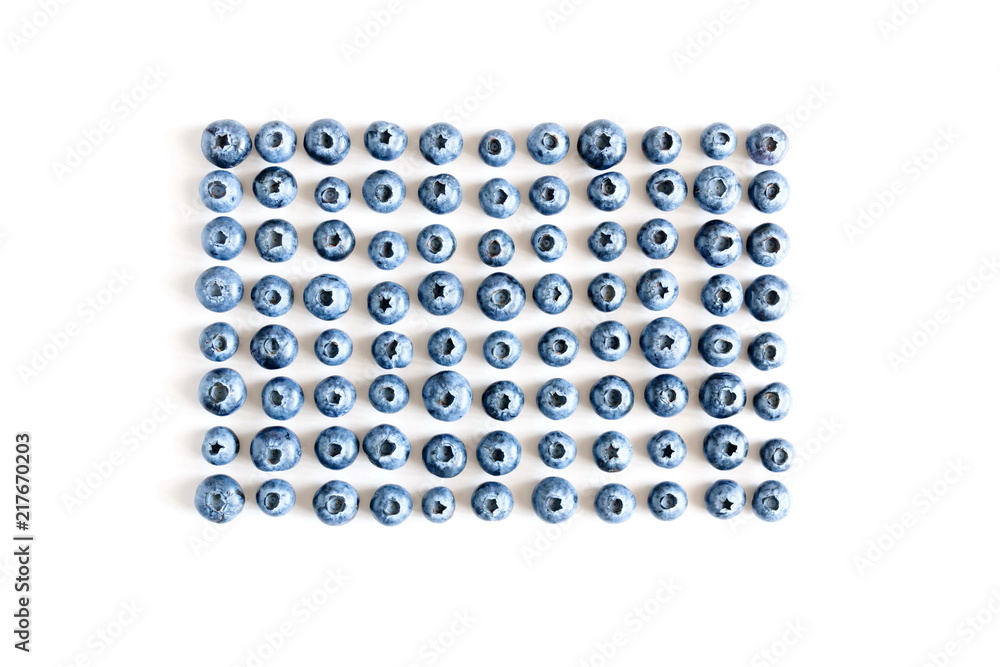 Blueberry. Pattern made of blueberries on a white background. Flat lay, top view, copy space Blueberry. Pattern made of blueberries on a white background. Flat lay, top view, copy space