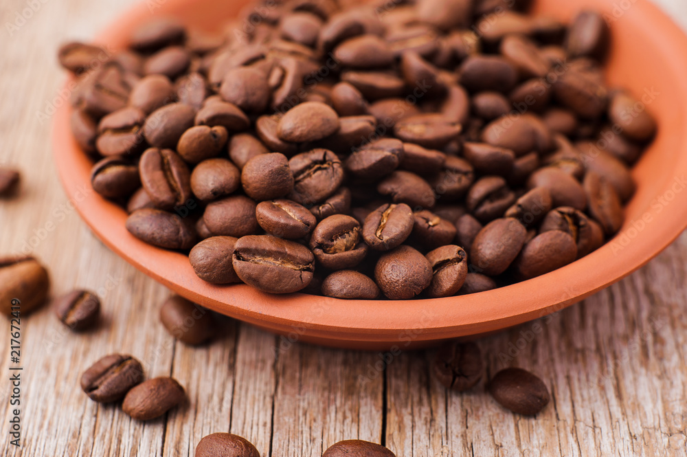 Coffee beans on textured surfaces Coffee beans on textured surfaces