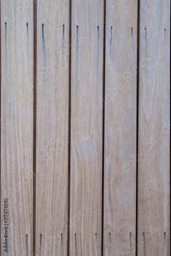 Wooden background, light texture of a wooden shield or a panel of aspen.