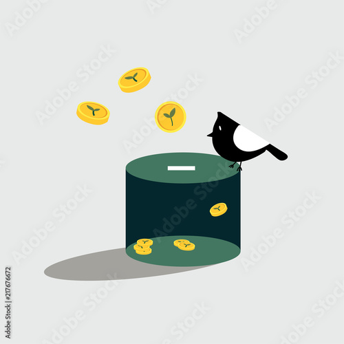 Bird standing on the donation box