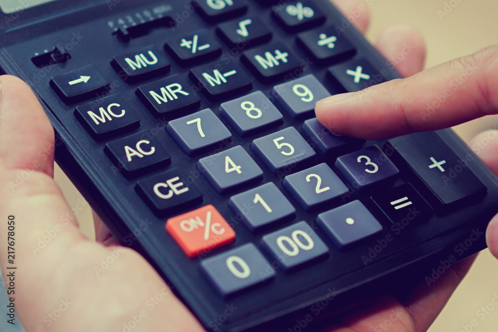 close up business woman hand pressing on calculator for working as accountant cocnept close up business woman hand pressing on calculator for working as accountant cocnept