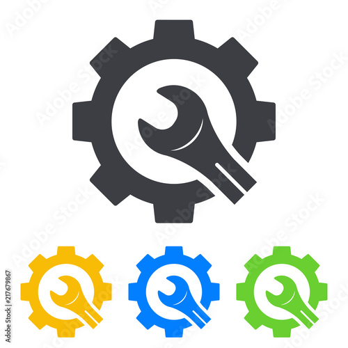 Icono plano engranaje con llave cortada en varios colores