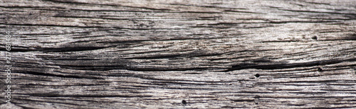 Surface eroded by time Old wood blur background.