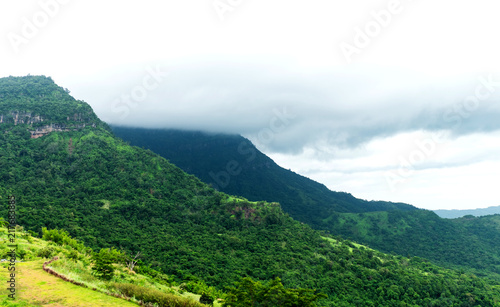 Peak mountain cover by cloud in mist in a scenic landscape view