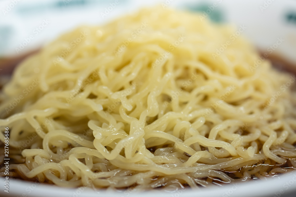Close up of yellow noodle with soup (Japanese Ramen) Asian traditional food. Close up of yellow noodle with soup (Japanese Ramen) Asian traditional food.