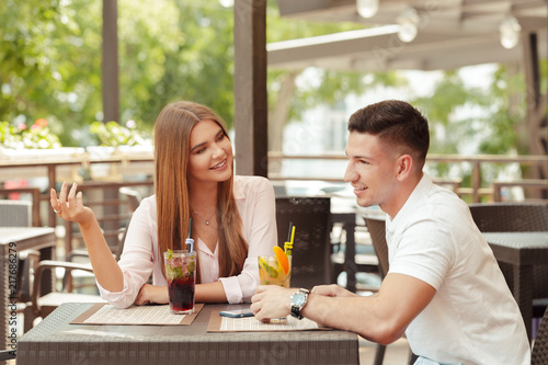 Two people in cafe enjoying the time spending with each other