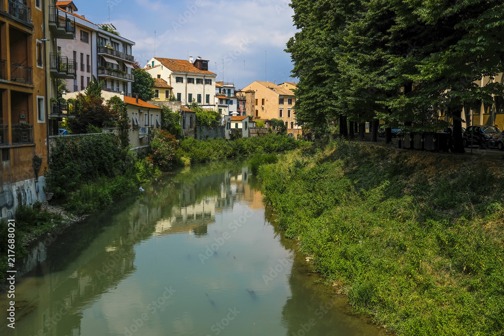 Padova, Italy - May, 6, 2018: Houses on a bank of channel in Padova