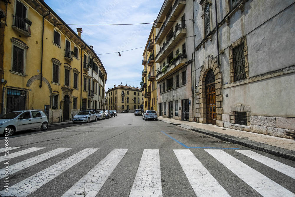 Obraz premium Verona, Italy - July, 15, 2018: street in a center of Verona, Italy