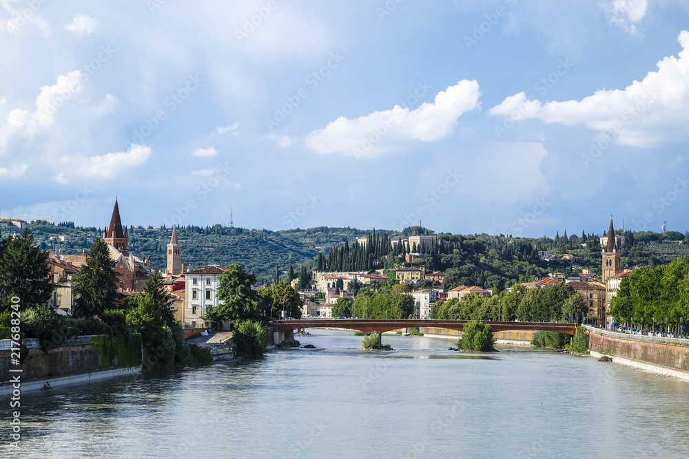 Verona, Italy - July, 23, 2018: embankment of Adige river in Verona, Italy