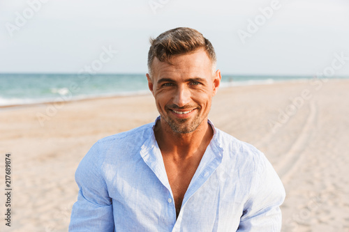 Portrait of a handsome smiling man in shirt