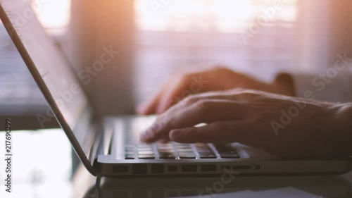 close up of hands typing on keyboard, writing email or  working on computer