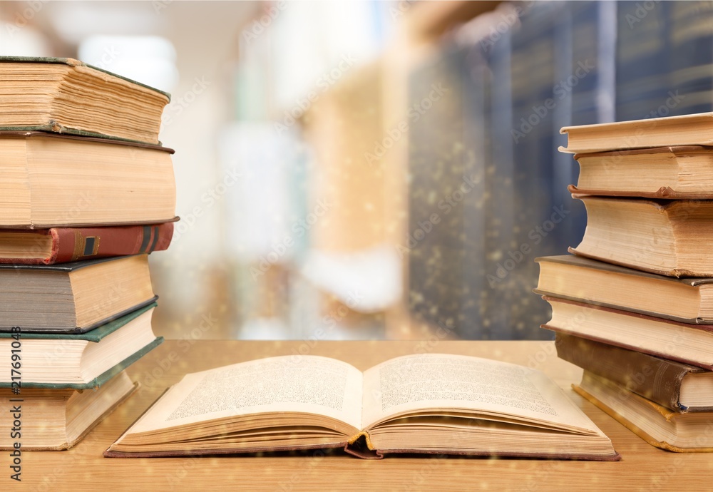 Old books on library background Old books on library background