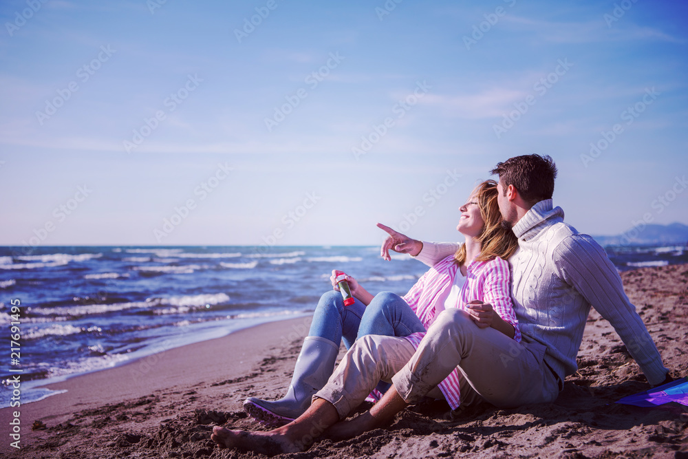 young couple enjoying time together at beach