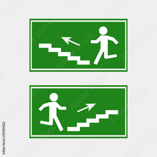 Wallpaper Mural Fire hazard. Route of evacuation vector icon. Icon of evacuation. Emergency exit on the stairs up or down. Layers grouped for easy editing illustration. For your design. Torontodigital.ca