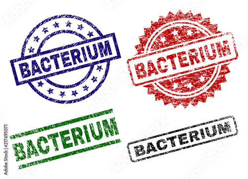 BACTERIUM seal imprints with corroded surface. Black, green,red,blue vector rubber prints of BACTERIUM text with dirty surface. Rubber seals with circle, rectangle, medallion shapes.