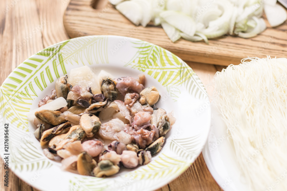 Seafood and rice spaghetti. Preparation of Chinese noodles with seafood. Seafood and rice spaghetti. Preparation of Chinese noodles with seafood.