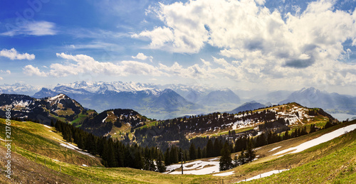 Landscape view of Alps snow mountain with pine tree looking from Rigi kulm Luzern SwitzerlandLandscape view of Alps snow mountain with pine tree looking from Rigi kulm Luzern Switzerland