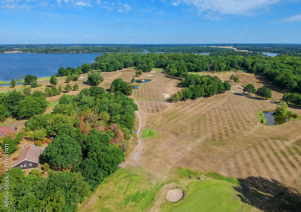 Summer dry golf field in Sweden Summer dry golf field in Sweden