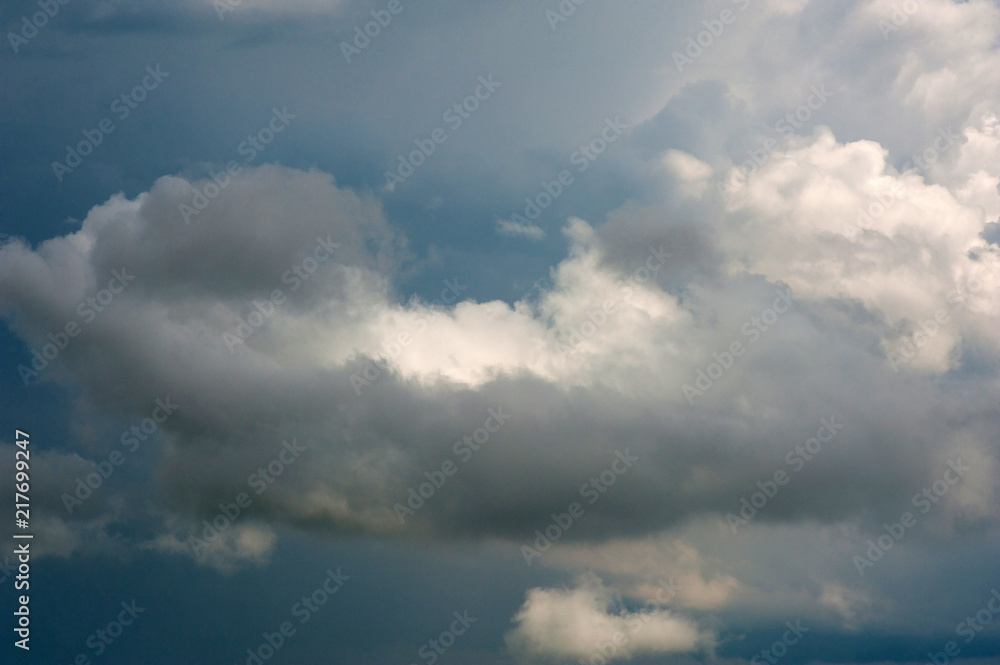 Beautiful white clouds in the blue sky as texture. Creative concept idea background.