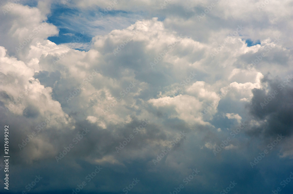 Beautiful white clouds in the blue sky as texture. Creative concept idea background. Beautiful white clouds in the blue sky as texture. Creative concept idea background.