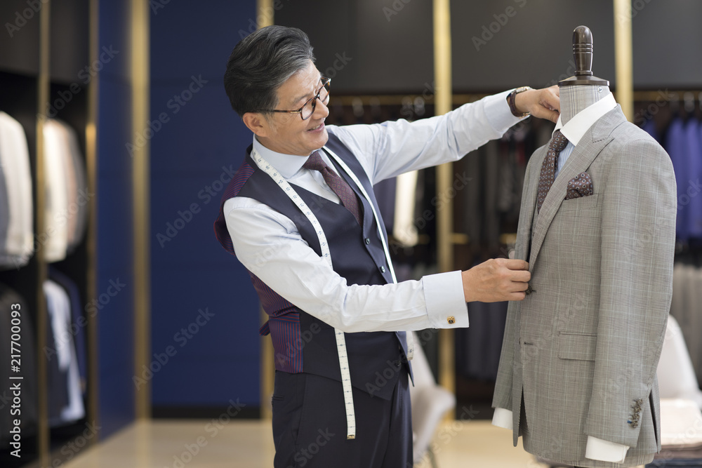 Confident fashion designer working Confident fashion designer working