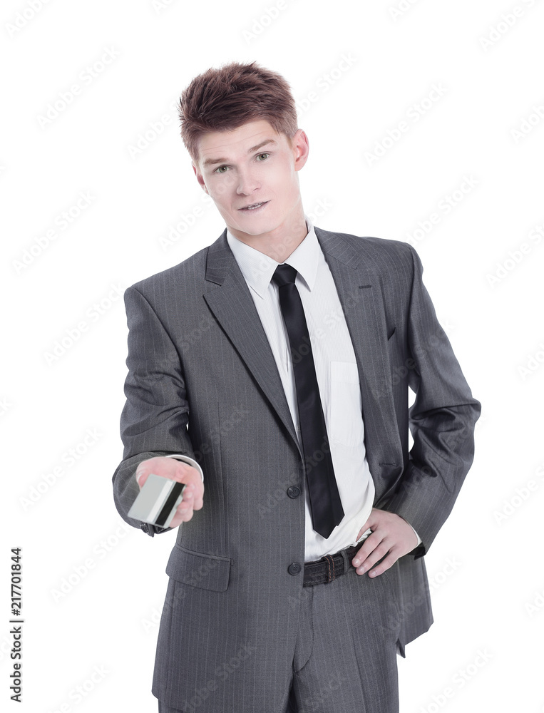 successful businessman holding out a blank business card. successful businessman holding out a blank business card.