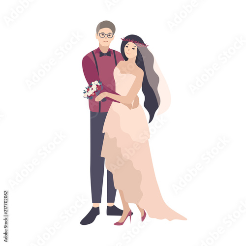 Stylish romantic couple posing during wedding ceremony