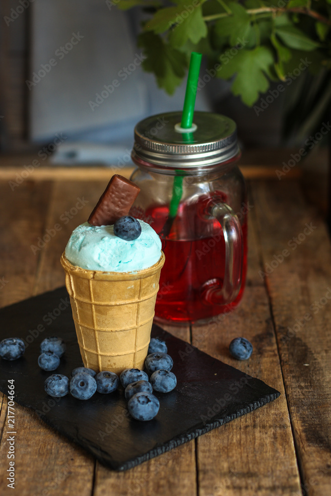 ice cream with blueberries (blue ice cream). food background. Top view with copy space ice cream with blueberries (blue ice cream). food background. Top view with copy space