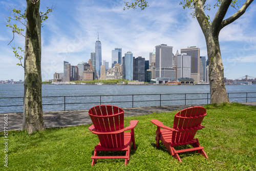 Chairs facing the skyline in New York City photo