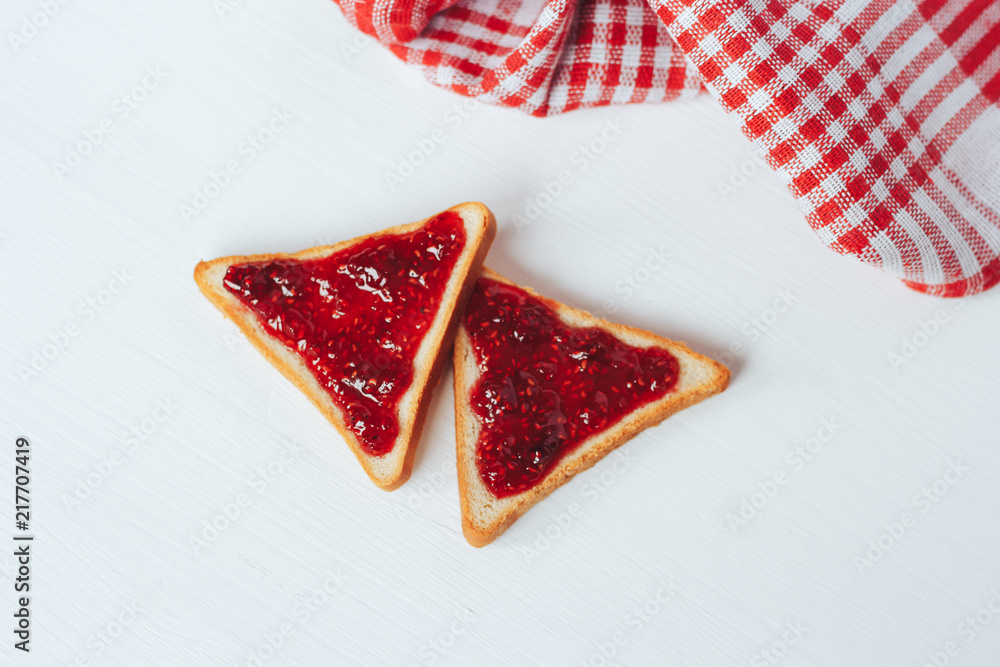 custom made wallpaper toronto digitalToast with raspberry jam on a white background.